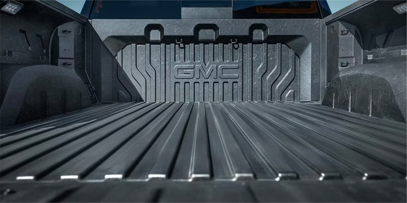 Image of a 2024 GMC Sierra 1500 truck bed and tailgate