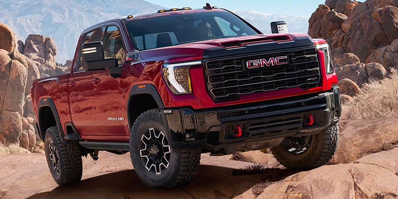 2025 GMC Sierra 3500HD with it's front tires propped up on a rock